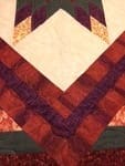 close up of quilted border around star